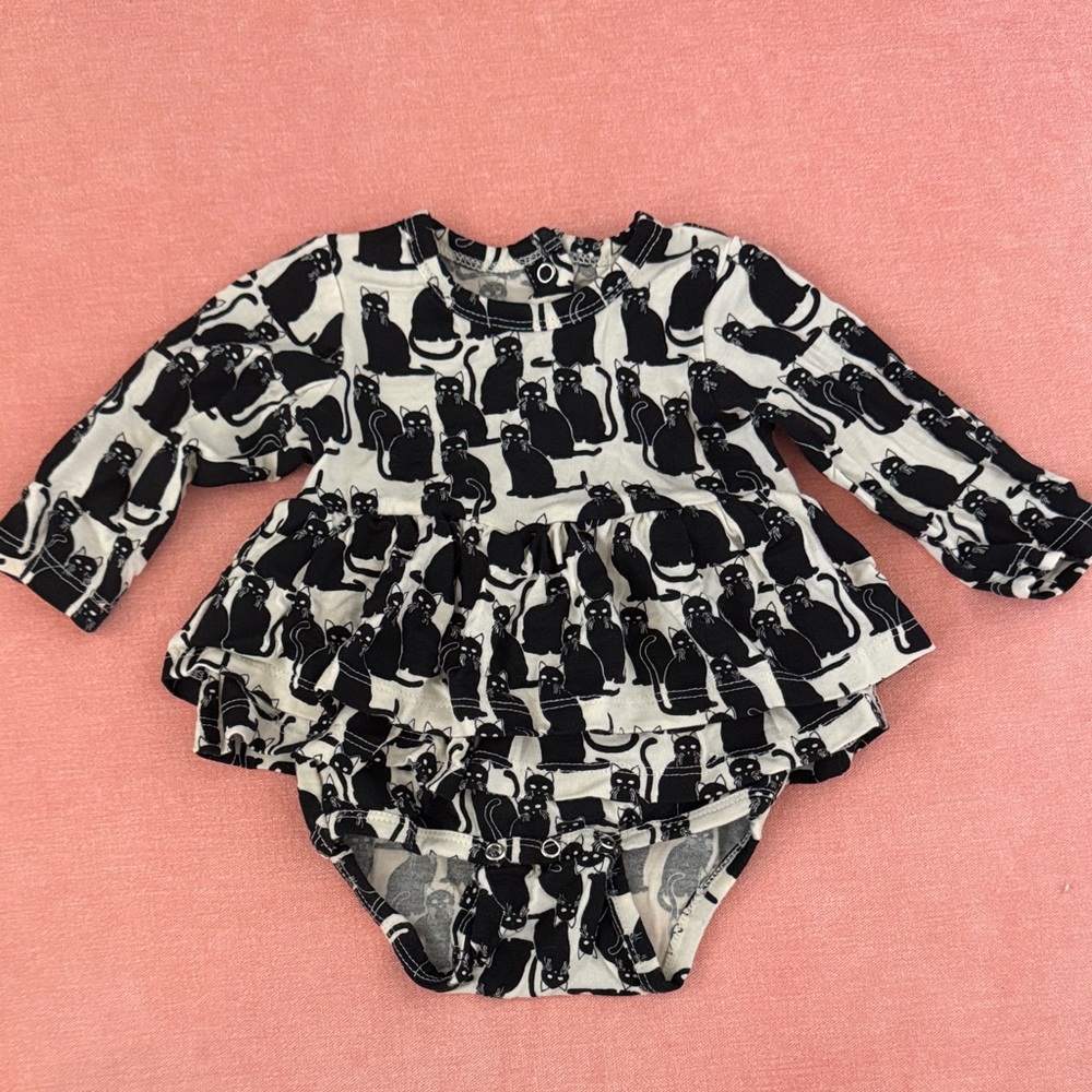 Kate Quinn ruffled bodysuit